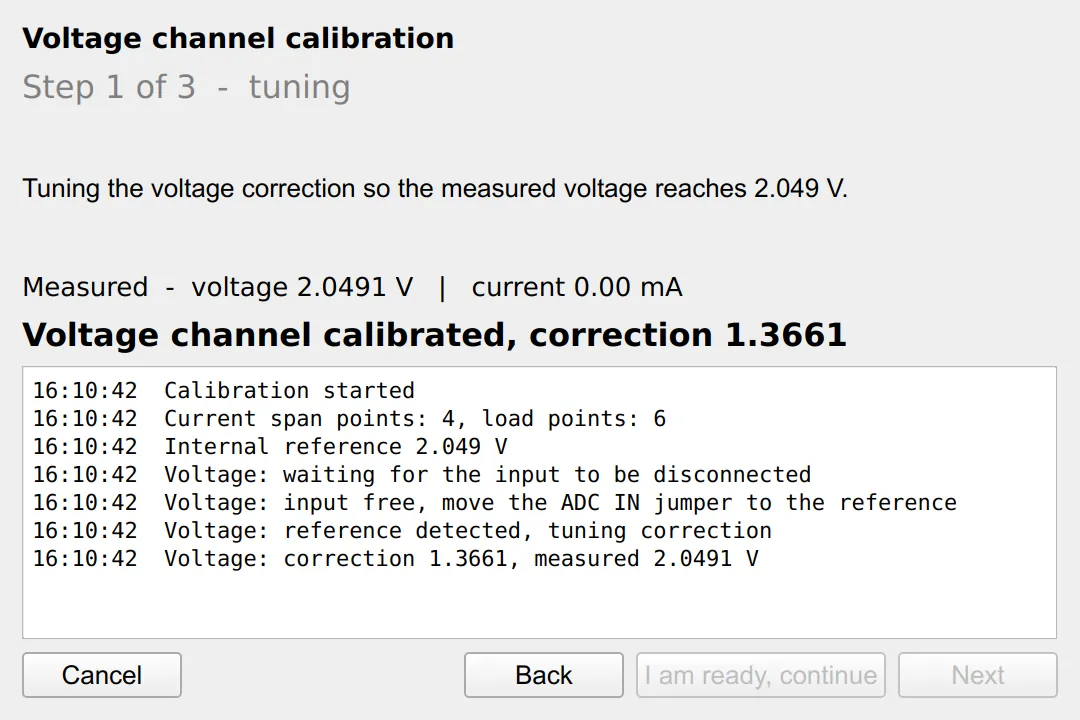 The voltage stage after tuning: the live reading has settled on 2.049 V and the correction is accepted